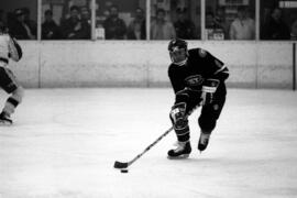 St. Cloud State hockey player Dan Dierbeck skates with the hockey during a game against Lake Superior State