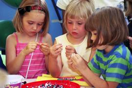 Children string beads, Lemonade Concert and Art Fair, St. Cloud State University