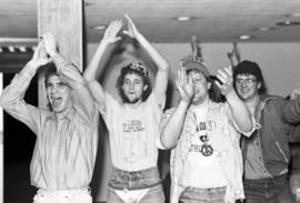 Men clap during the KVSC trivia weekend closing ceremonies, St. Cloud State University