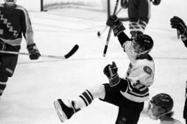 St. Cloud State men's hockey player celebrates a goal against Northern Michigan University