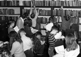 Children use the library, Old Model School (1906), St. Cloud State University