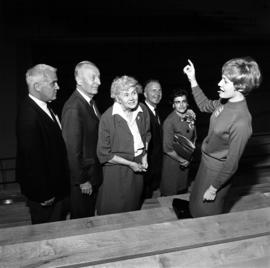 Former St. Cloud State president George Selke, his wife Carol Selke, and others tour Halenbeck Hall