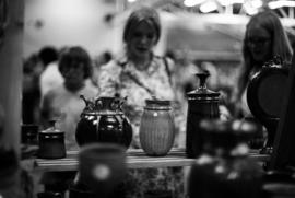 Vases sit on a shelf, Lemonade Concert and Art Fair, St. Cloud State University