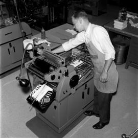 Industrial Arts student works on a machine, St. Cloud State University