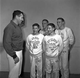 Wrestlers Jim and Dave Hazewinkel and Grant and Gary Nelson, St. Cloud State University