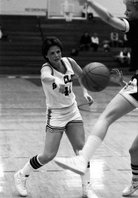 Bonnie Henrickson passes the basketball against the University of Minnesota-Duluth, St. Cloud State University