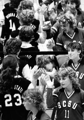 St. Cloud State volleyball team shakes hands with Winona State players