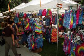 A vendor's booth with t-shirts, Lemonade Concert and Art Fair, St. Cloud State University