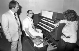 Gary Bartlett and Margaret Vos speak to the carillon organist at Atwood Memorial Center (1966), St. Cloud State University