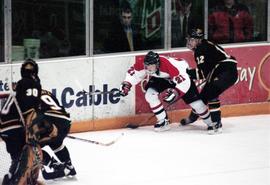 Action during a hockey game against the Michigan Tech University, St. Cloud State University