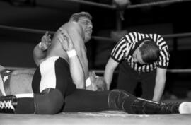 Wrestler Wayne Bloom pins Brad Rheingans during a match at the Sauk Rapids High School