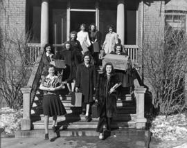 Students leave Lawrence Hall (1905) to make way for the Air Corps, 72nd Detachment, St. Cloud State University