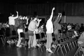 A group stands during the KVSC trivia weekend closing ceremonies, St. Cloud State University