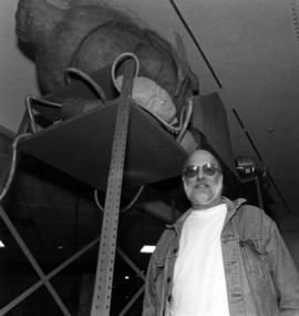 Joe Aiken with his piece Gateless Gate, St. Cloud State University