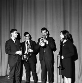 Doc Severinsen practices with students Jeff Rudolph, Ken Melich, and Anna Mae Stepan, St. Cloud State University