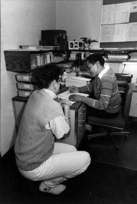 Lula Mische helps a student in Career Services, St. Cloud State University