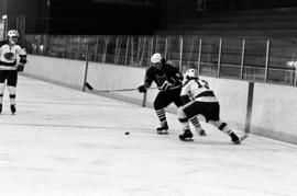 St. Cloud State hockey player Pat Sullivan handles the puck against Chicago State in men's hockey