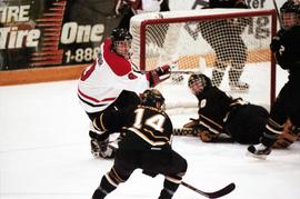 Action during a hockey game against the Michigan Tech University, St. Cloud State University