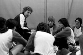 Softball coach Dianne Glowatzke talks during practice, St. Cloud State University