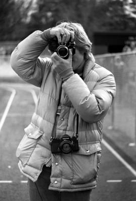 Tom Roster takes a picture at a St. Cloud State University football game