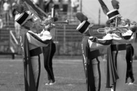 Marching band performs at a football game, St. Cloud State University