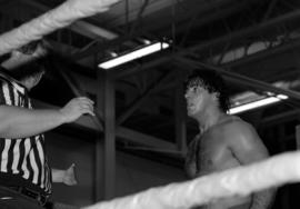 Ricky Martel argues with the referee during his wrestling match at Halenbeck Hall (1965), St. Cloud State University