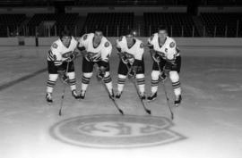 St. Cloud State hockey players Scott Chartier, Tony Schmalzbauer, Craig Shermoen, and Vic Brodt