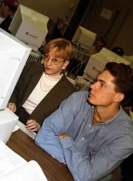 Chris Jazwinski helps a student, St. Cloud State University