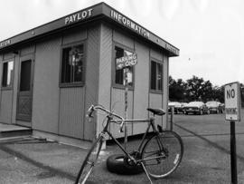 Bicycle in front of a paylot booth, St. Cloud State University