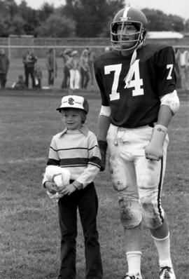 Carl Larson with child during Big Brother and Little Sisters Day