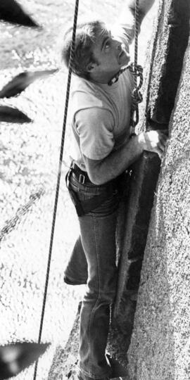 Bob Schultz climbs a cliff during a visit to Taylors Falls State Park, St. Cloud State University