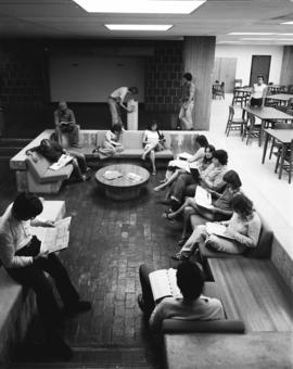 Students study at the Centennial Hall (1971) sunken lounge, St. Cloud State University