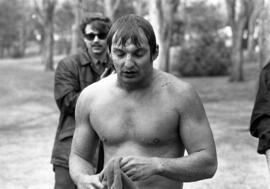 Peter Noll reacts after swimming across the Mississippi River, St. Cloud State University