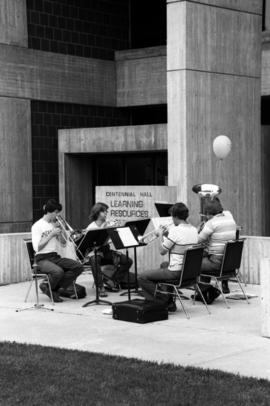 Three women play flutes together, Lemonade Concert and Art Fair, St. Cloud State University