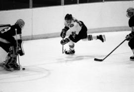 St. Cloud State University hockey player Bret Hedican shoots the puck on goal during a game against Michigan Tech University