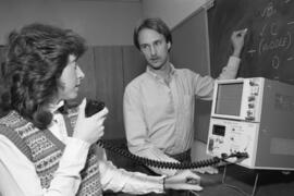 A man and woman work together, Speech Pathology, St. Cloud State University