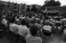 People listen to a musical group perform, Lemonade Concert and Art Fair, St. Cloud State University