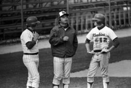 Denny Lorsung talks to Greg Berling and Darrell Watercott during the St. Cloud State University baseball game against Southwest State University