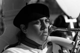 A marching band member at a football game, St. Cloud State University