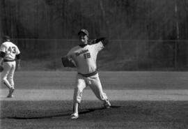 Baseball pitcher Pete Pratt throws a baseball, St. Cloud State University