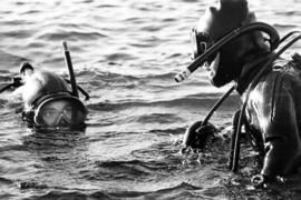 St. Cloud State University Scuba Club members Joe Streit and Carlo Schwinn prepare for a dive