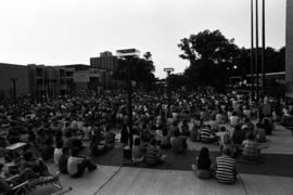 People listen to an orchestra play, Lemonade Concert and Art Fair, St. Cloud State University