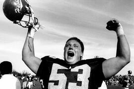 Football player Brian Larson celebrates St. Cloud State University's victory over North Dakota State University
