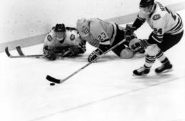 Hockey player moves the puck, St. Cloud State University