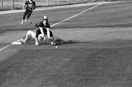 A player slides into third base during a St. Cloud State University baseball game against Southwest State University