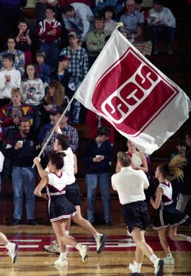 Cheerleaders motivate the crowd to cheer, St. Cloud State University