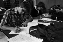 Students studying in Centennial Hall (1971) during finals week, St. Cloud State University