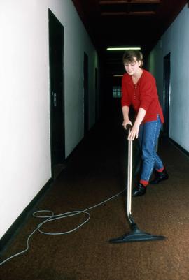 St. Cloud State student vacuums a corridor, Aalborg, Denmark