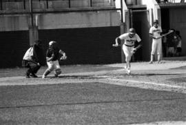 Bob Hegman runs down a baseline during a St. Cloud State University baseball game against the University of Minnesota-Duluth