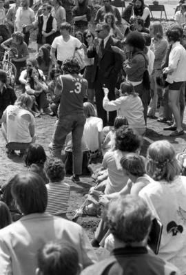 People listen to a speech, Day of Peace protest, St. Cloud State University